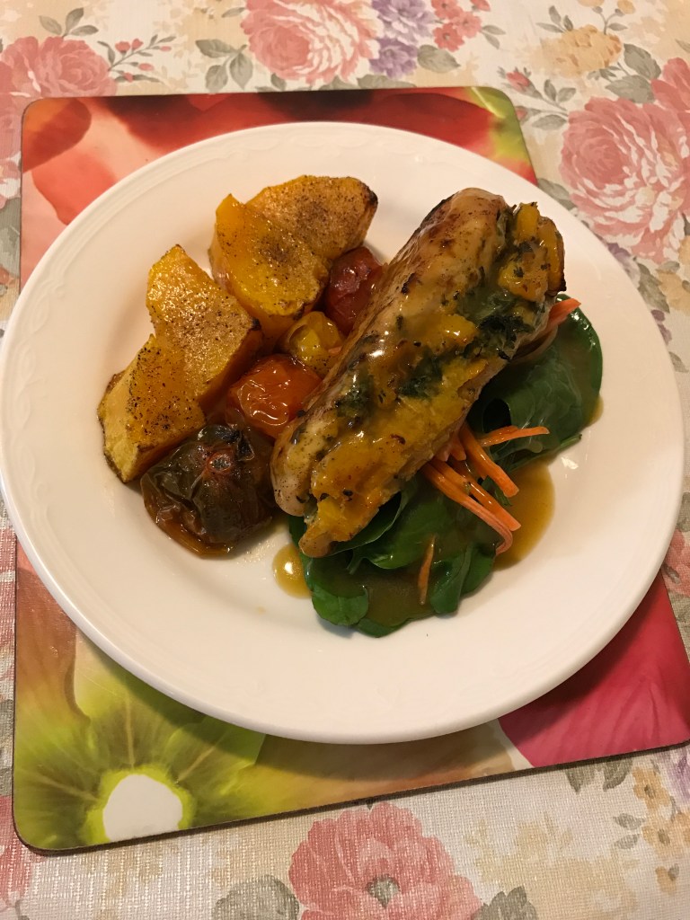 Sous vide chicken stuffed roasted pumpkins tomatoes on a bed of mixed salad.JPG