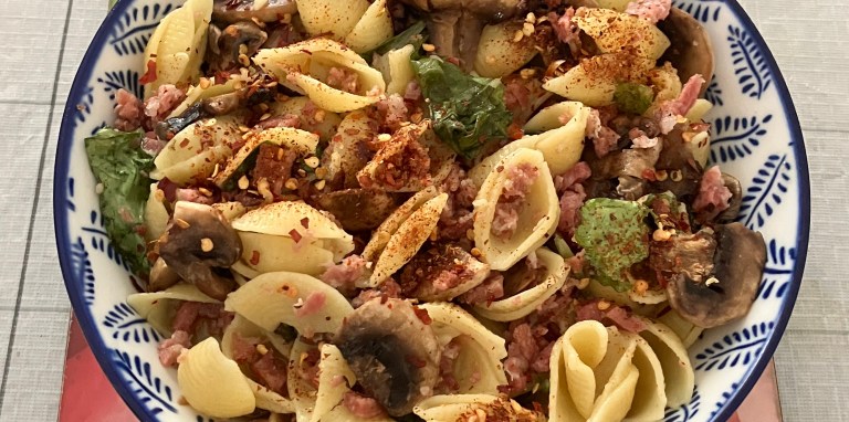Bacon salami vegetables shell pasta with cayenne garlic butter sauce ...